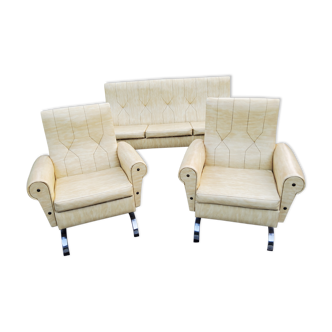 Armchairs and sofa of the 60s/70s in moleskine and chrome base on springs