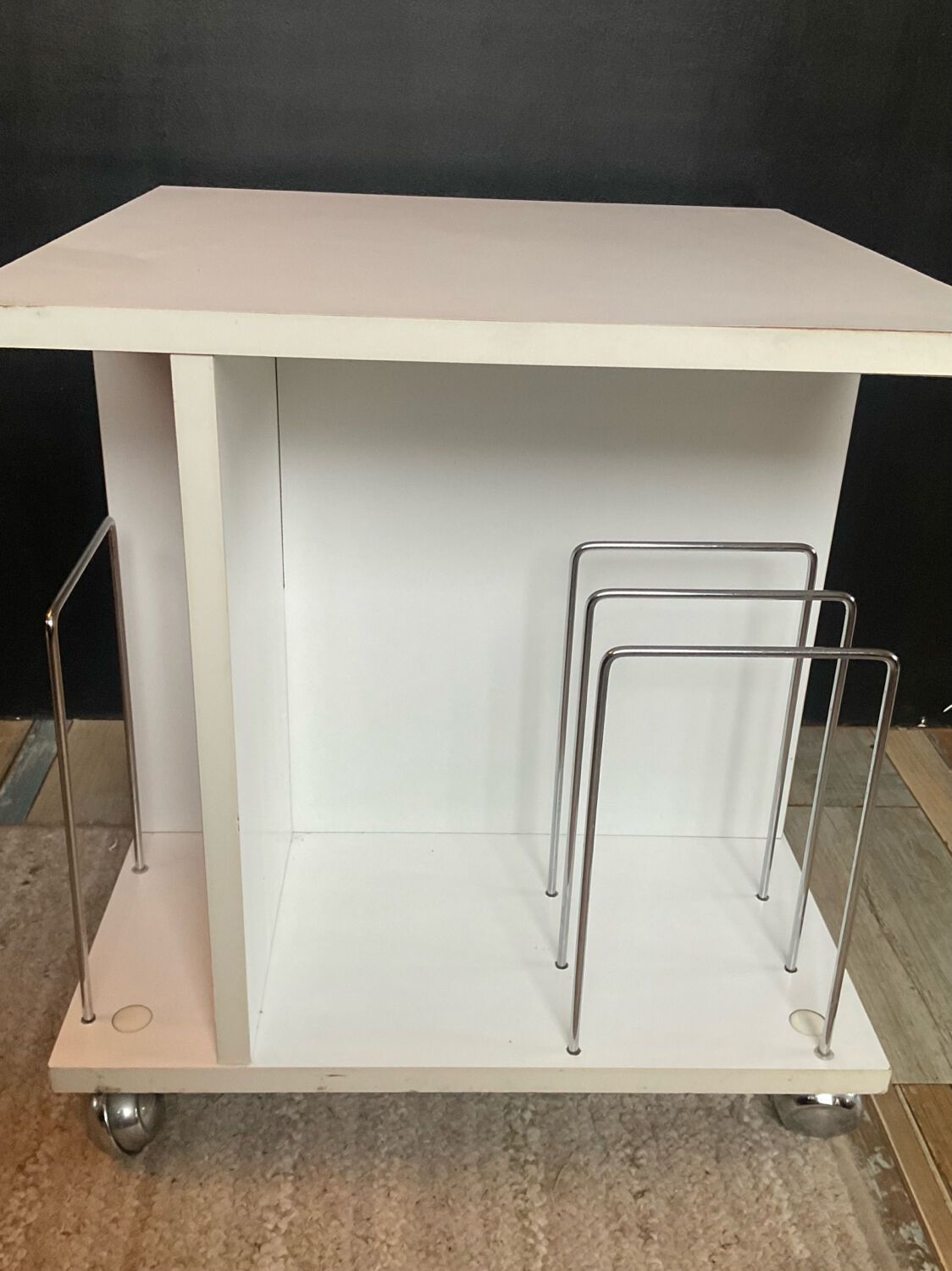 Small side table with storage for vinyl records from the 1970s.