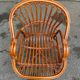 Adult rattan and wicker armchair, 1975, with beige cushion