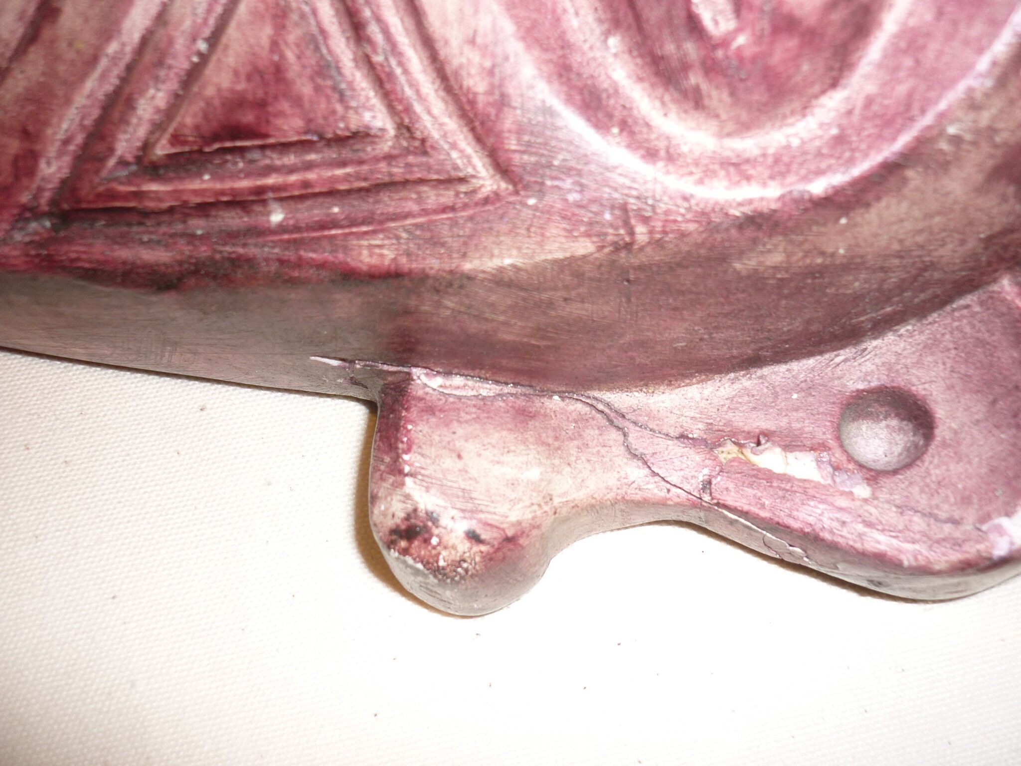 African mask in earth