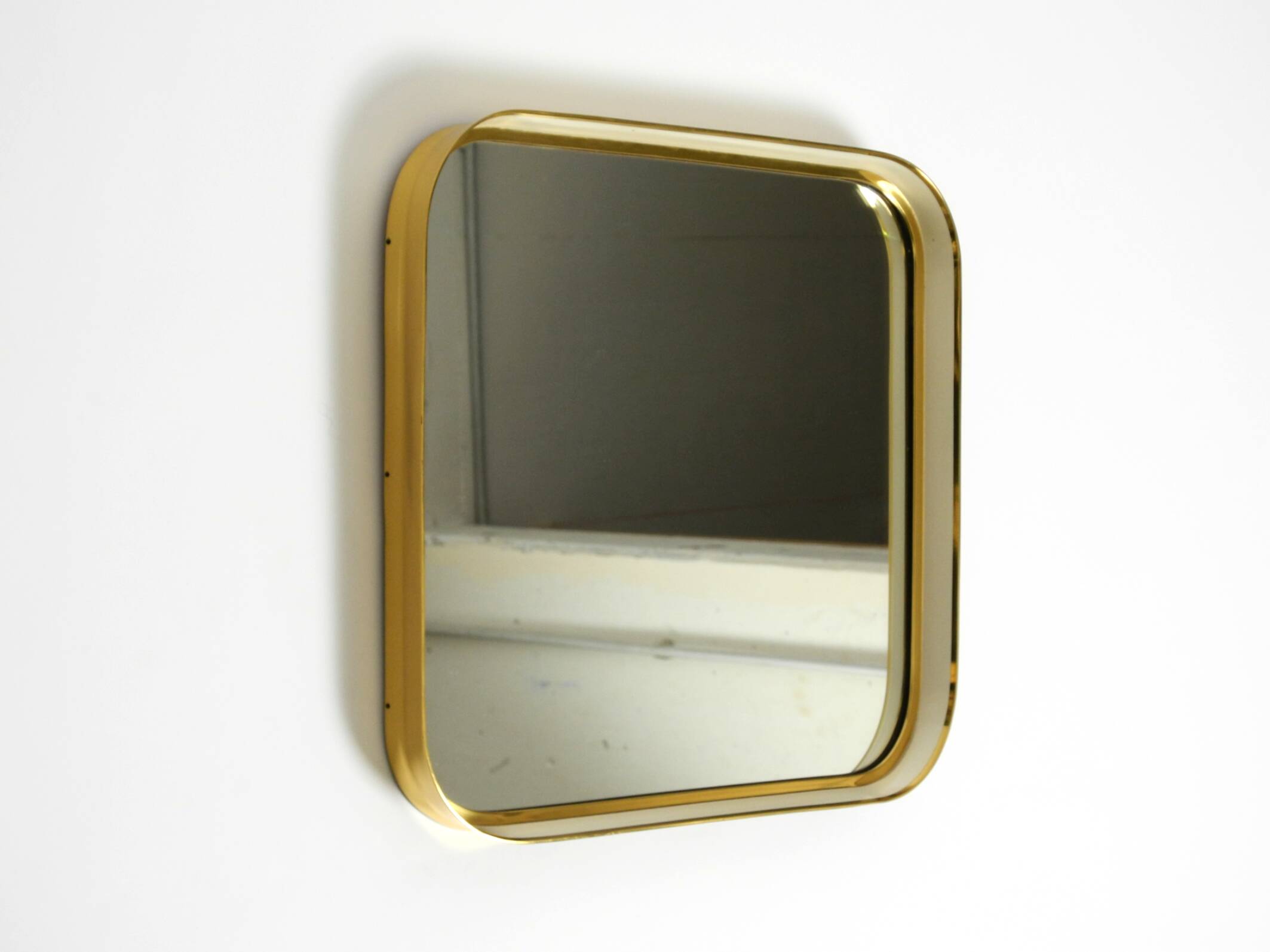 Beautiful original Mid Century Modern "Zier-Form" wall mirror with heavy br