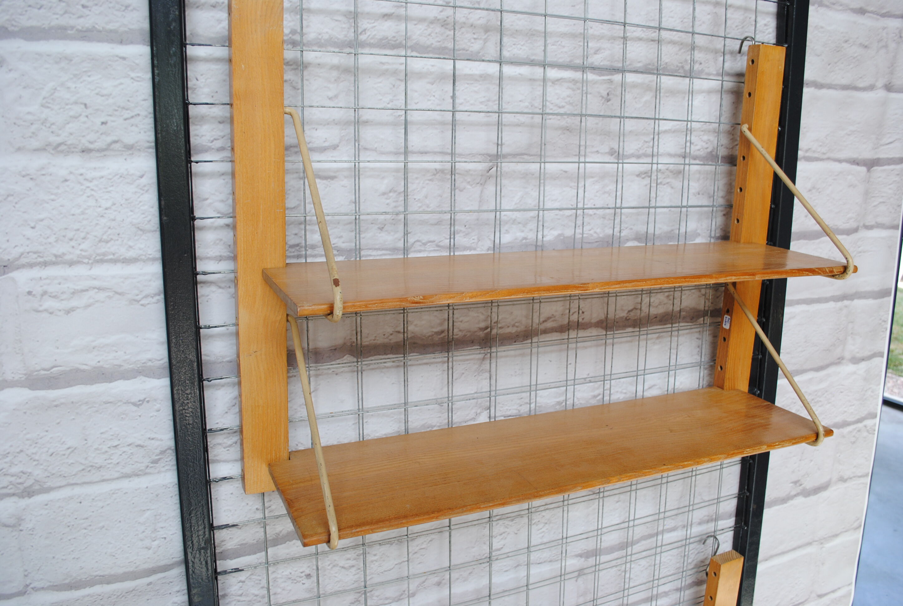 Wooden and metal wall shelf