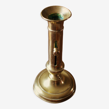 Brass pusher torch candle holder