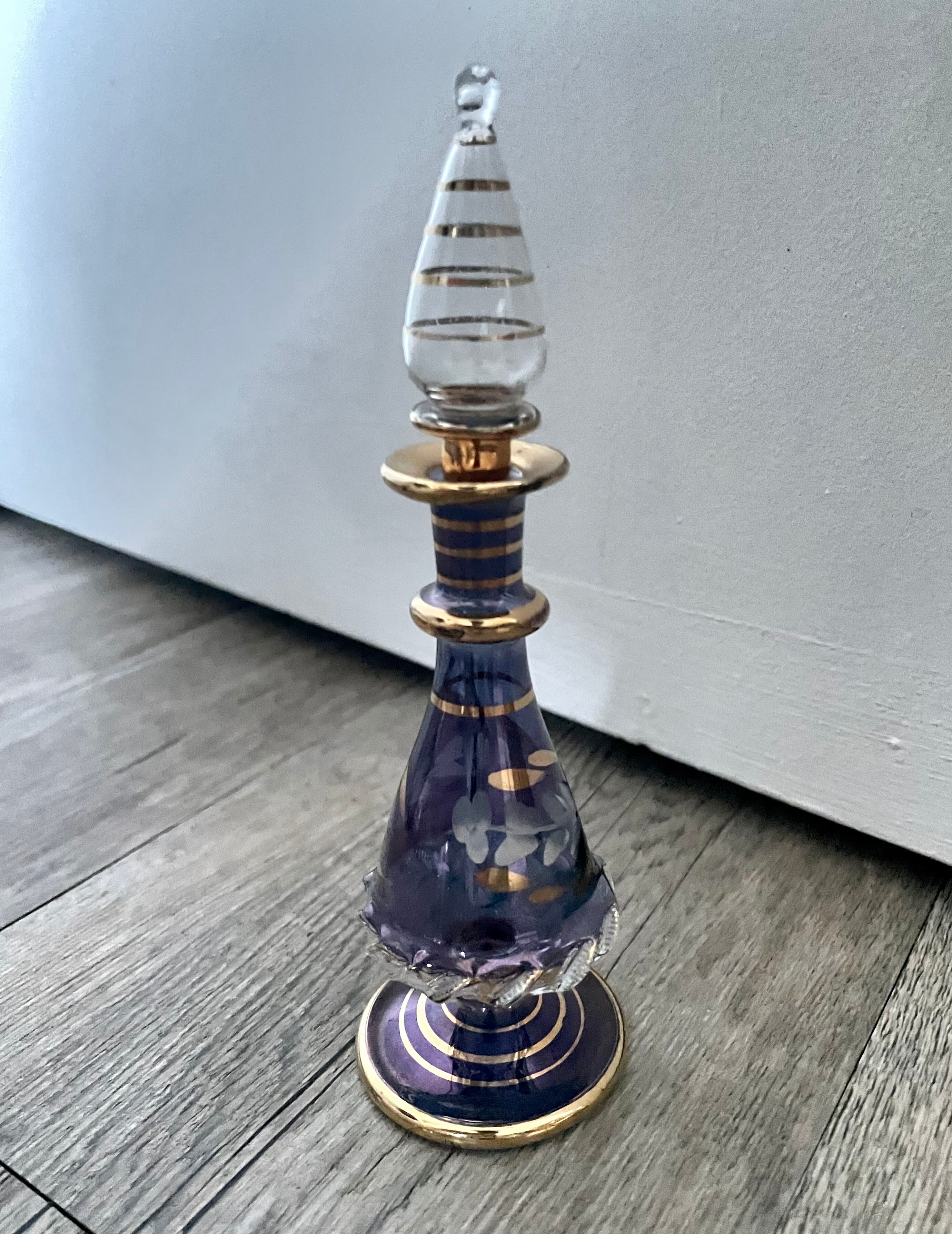 Purple glass perfume bottle