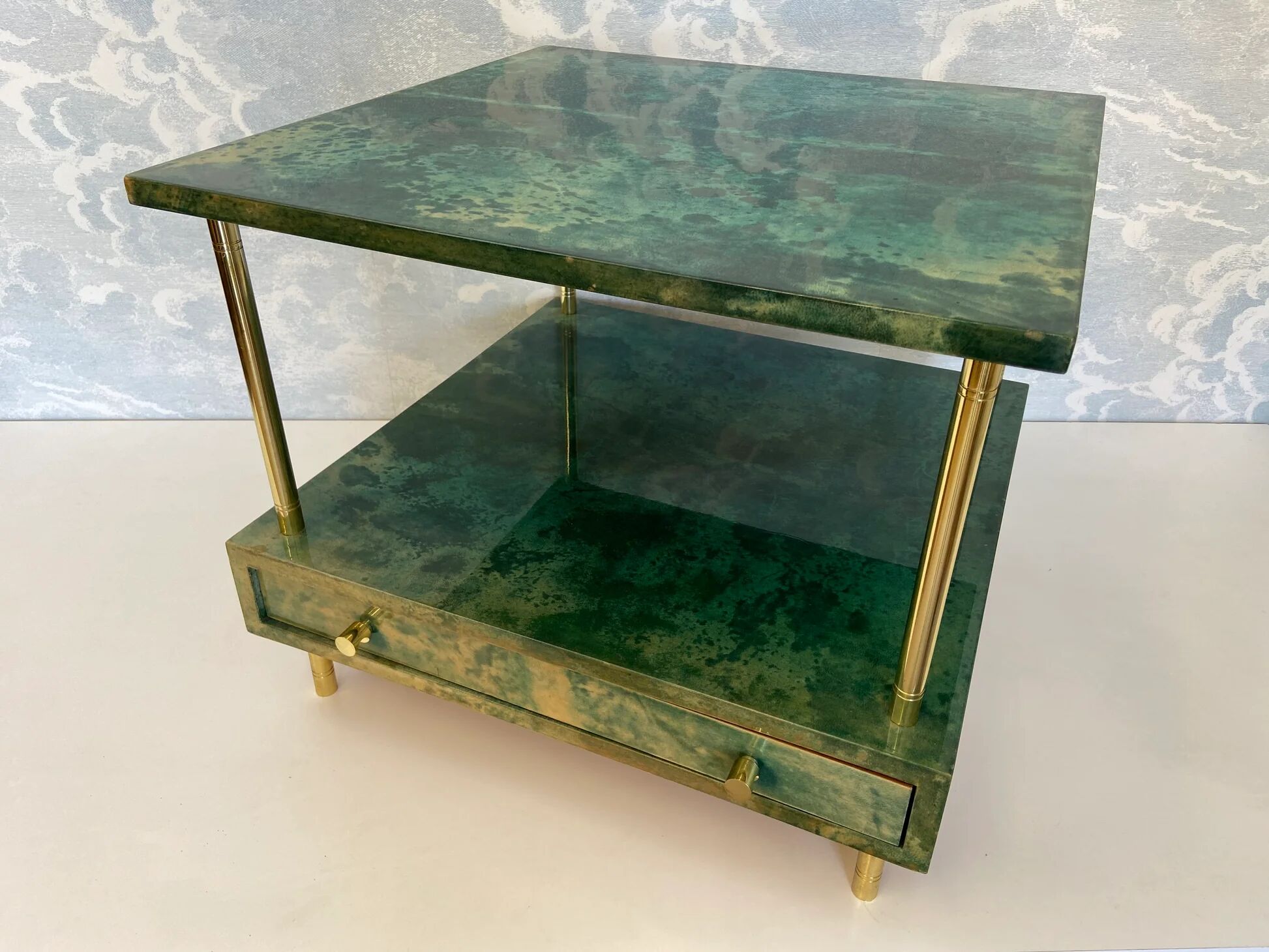 Aldo Tura side table in aqua green with brass legs and lower drawer.