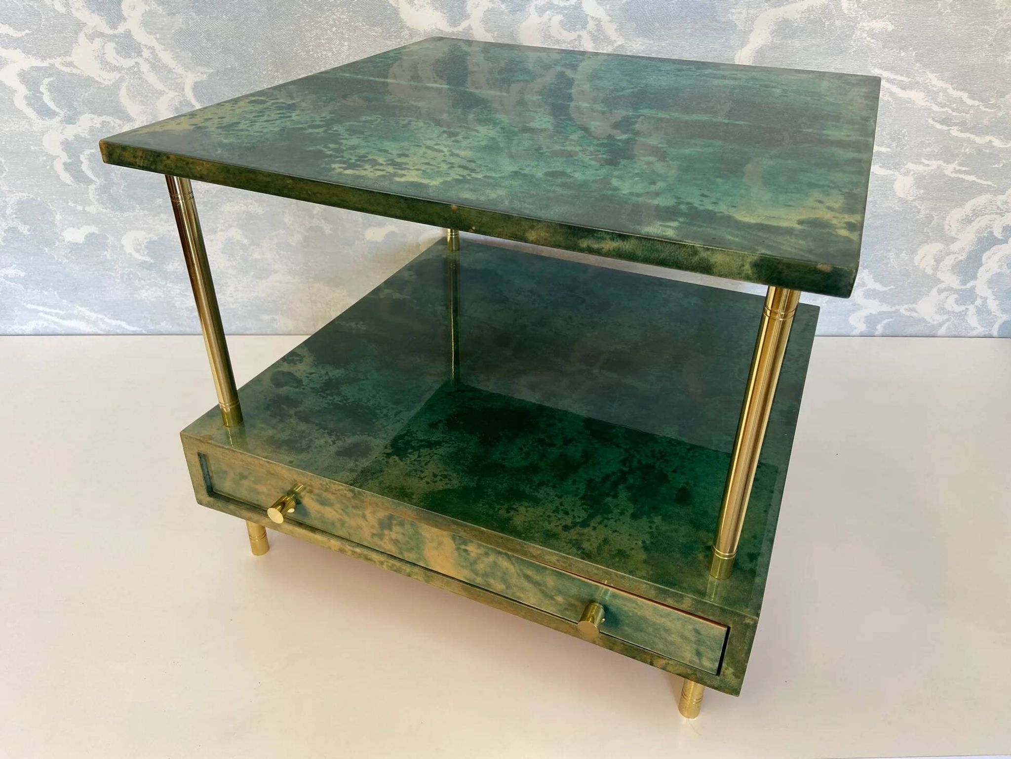 Aldo Tura side table in aqua green with brass legs and lower drawer.