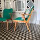 Fauteuil vintage bois et skaï vert