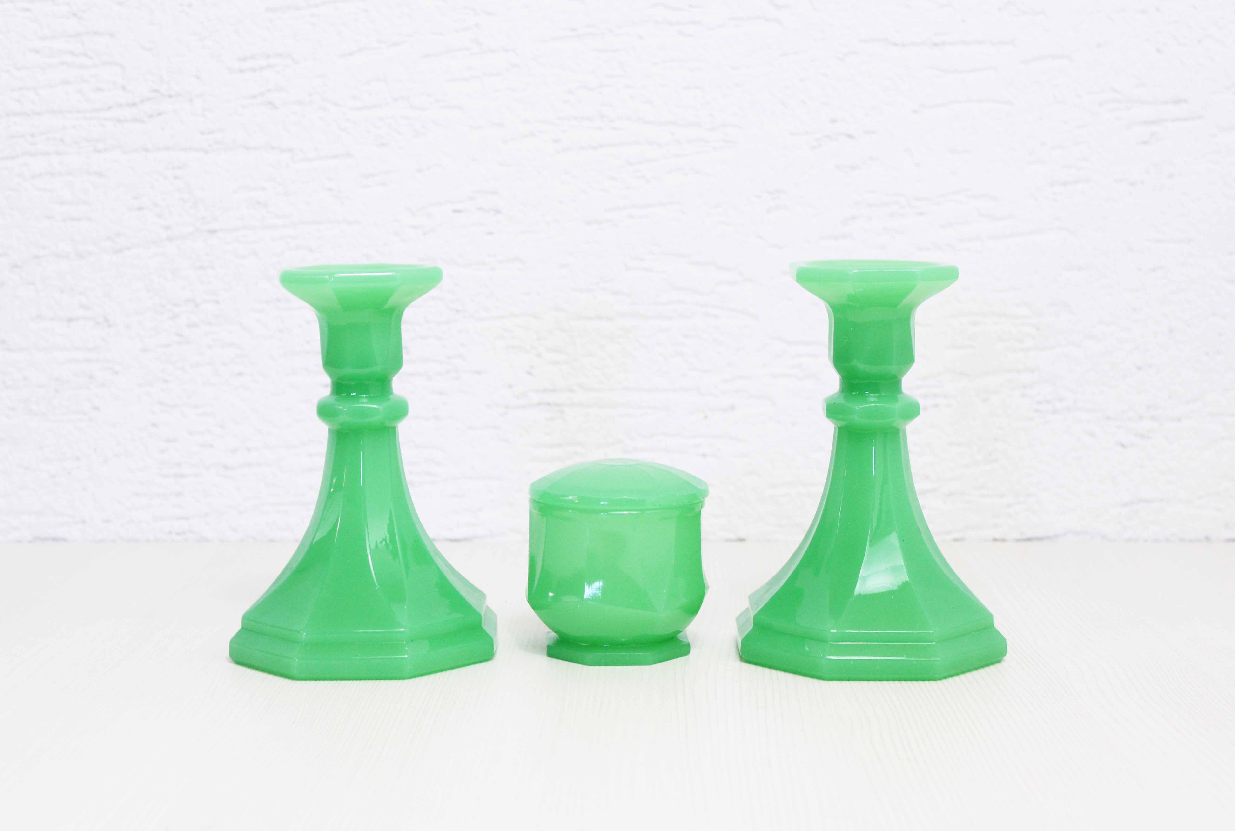 Set of two candlesticks and an Art Deco cup