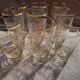 9 art-deco glasses in engraved crystal with gold trim