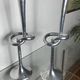 Pair of large aluminium bow candlesticks, Italy, 1970.
