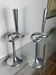 Pair of large aluminium bow candlesticks, Italy, 1970.