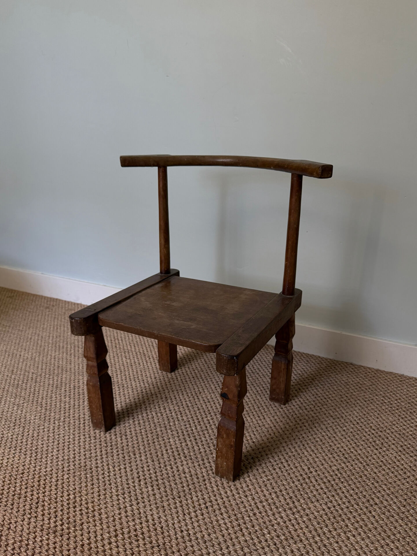Handcrafted low chair in solid wood – Ivory Coast