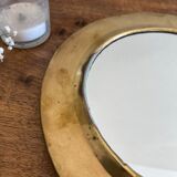 Brass half-moon mirror
