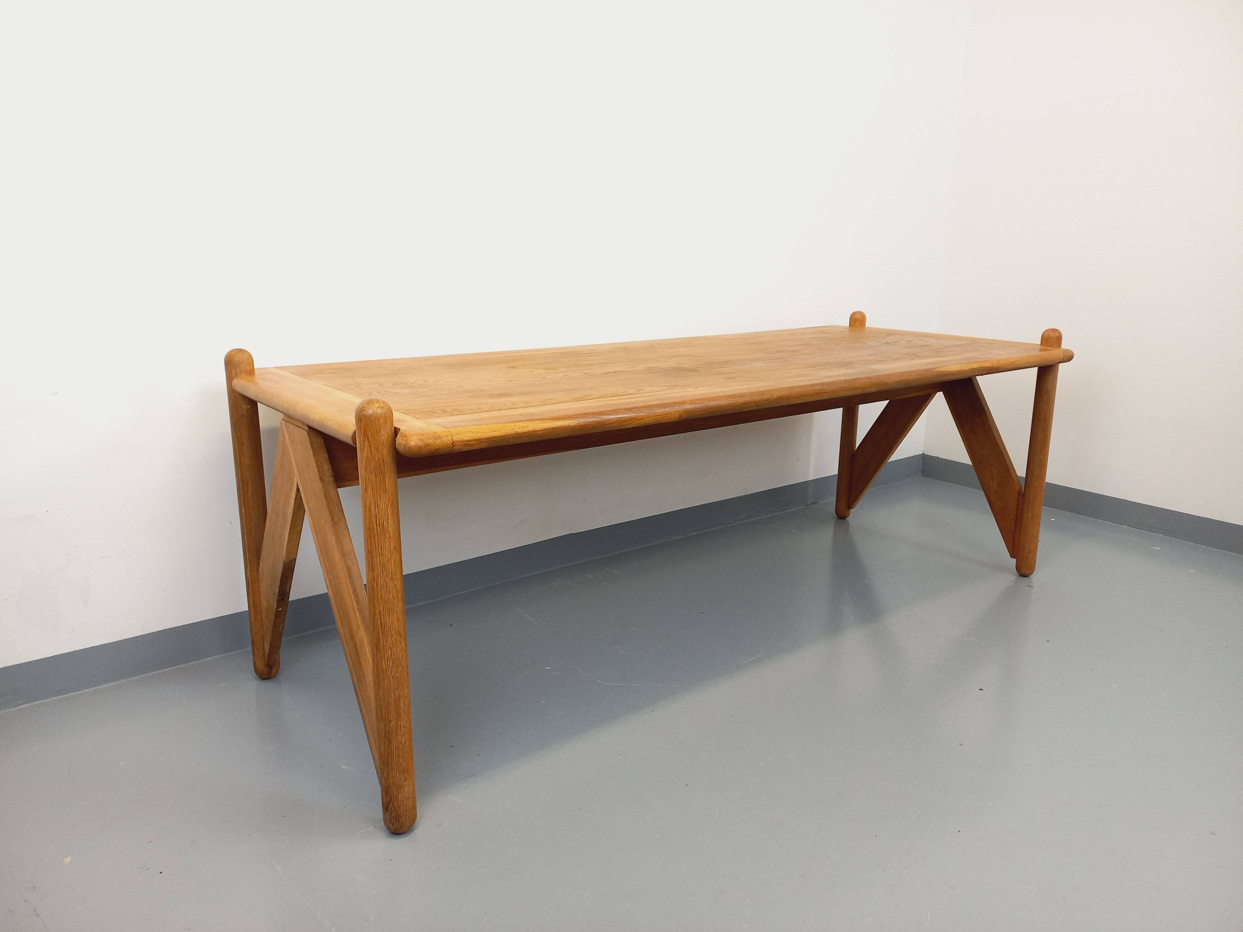 Large vintage brutalist rectangular table made of solid oak wood.