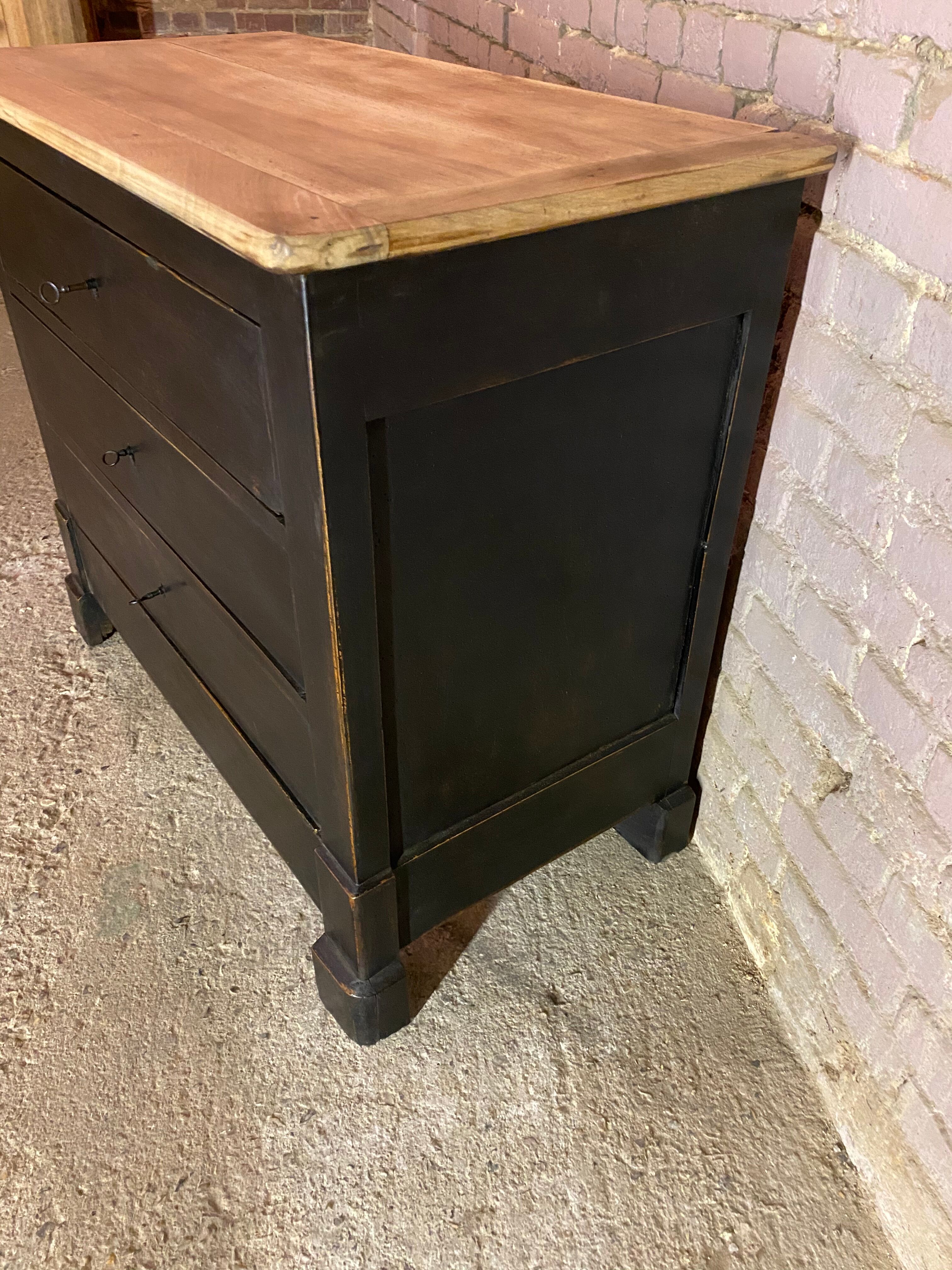 Old black patinated chest of drawers