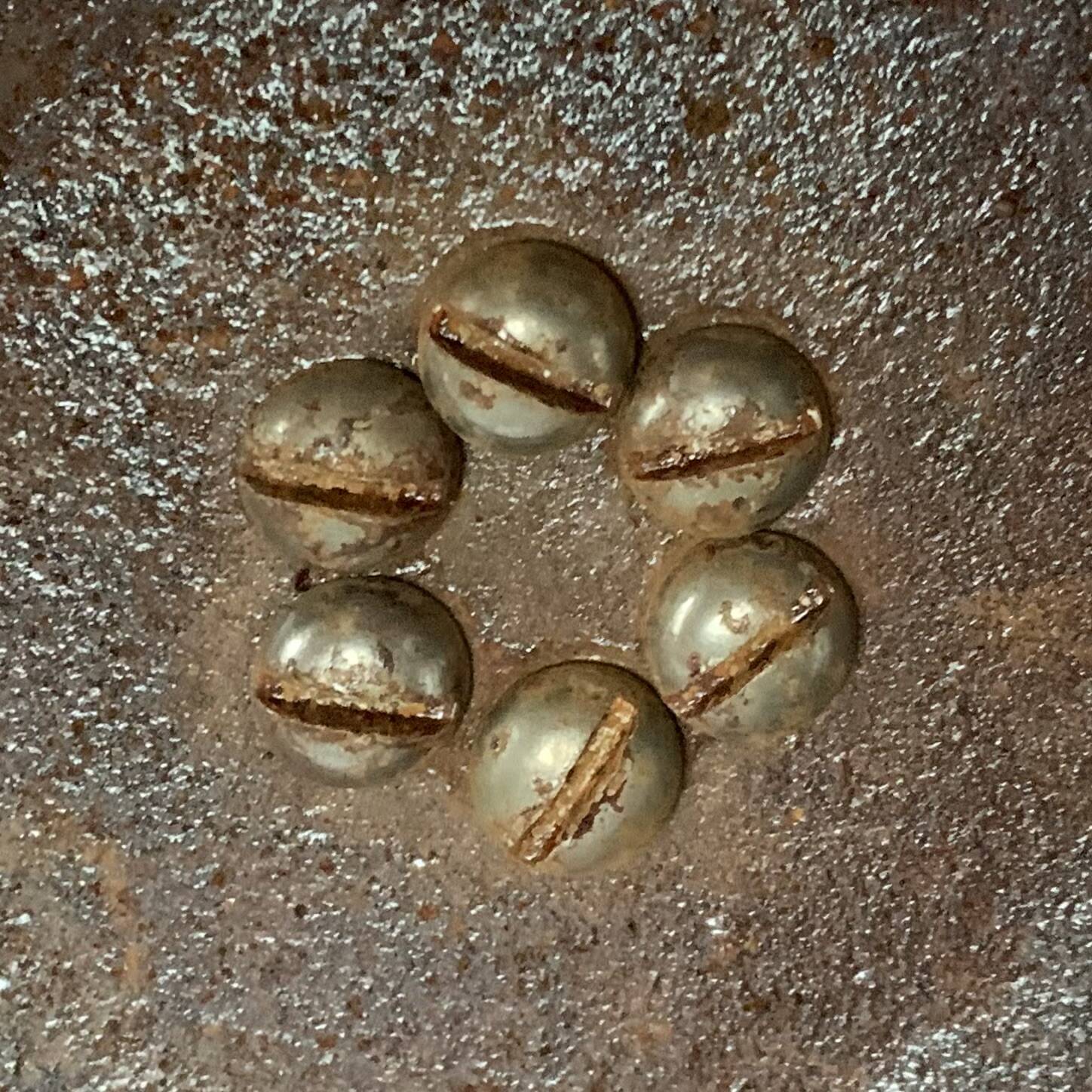 Old brass and chrome-plated metal ashtray on stand
