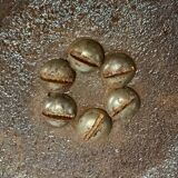 Old brass and chrome-plated metal ashtray on stand