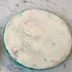 Duo of green slip bottle coasters signed marjac bauzil 50s