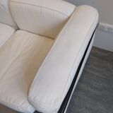 A sofa and two LC2 Cassina armchairs