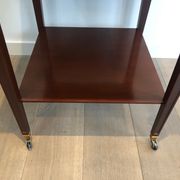 Two-level table in mahogany and brass