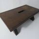 Old small wooden bench step in solid oak