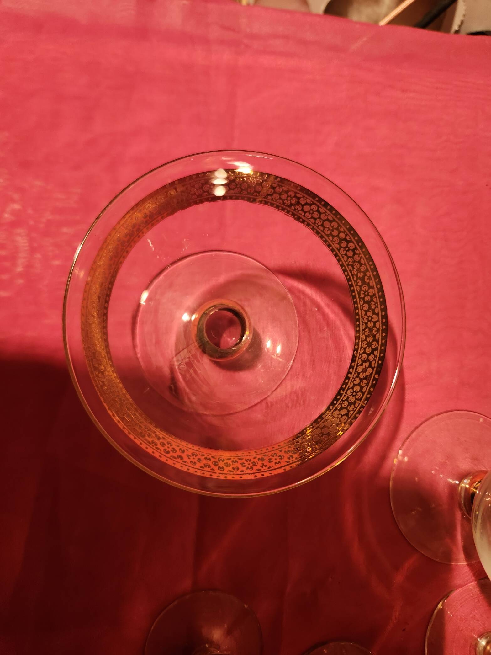 1930s footed glass service with gilding, including champagne flutes.