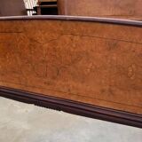 Brown lacquered wooden double bed frame in Mid-Century style from the 1940s.