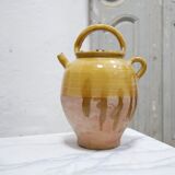 Old gargoulette pot in glazed terracotta
