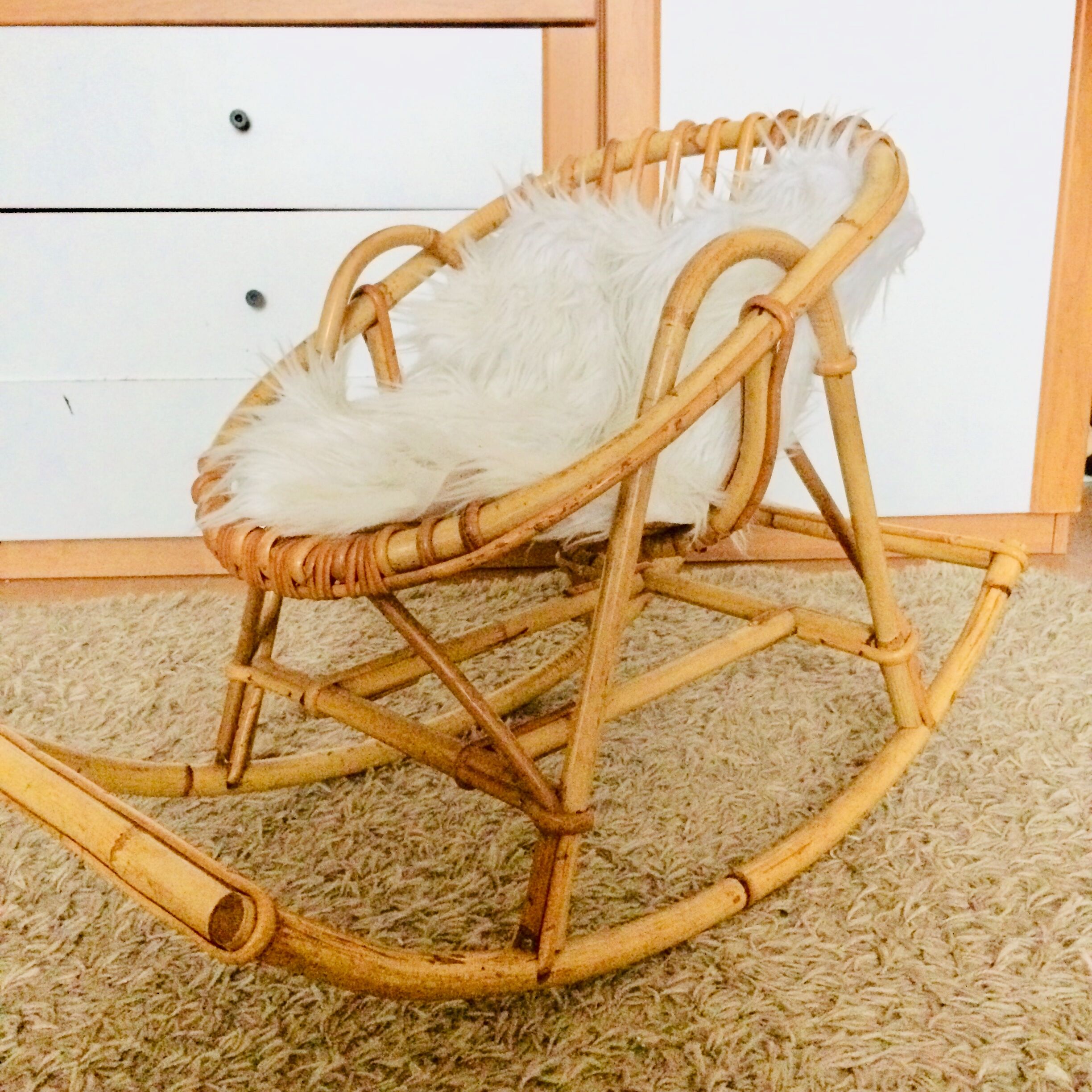 Vintage rattan children's rocking chair