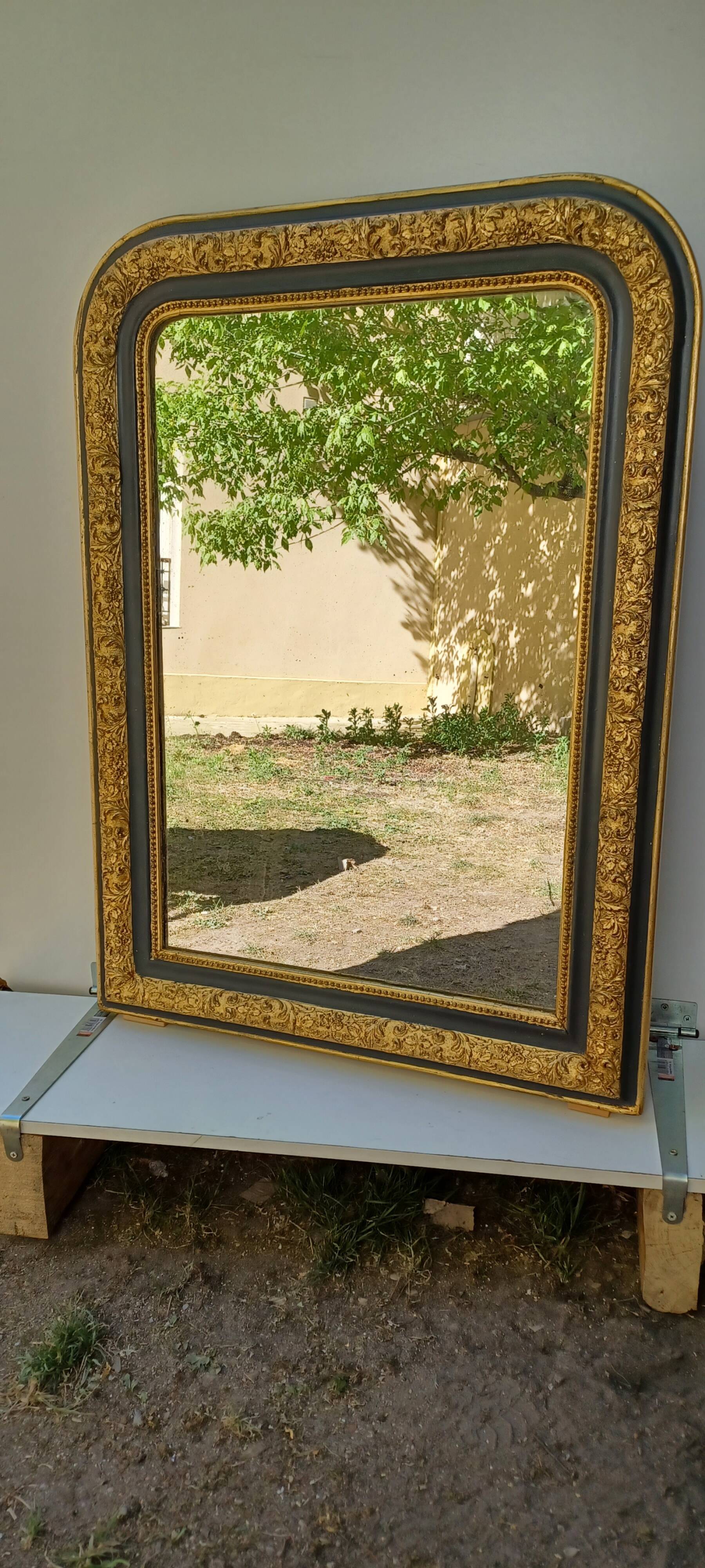 Louis-Philippe mirror, gilded and grey patina, circa 1890.