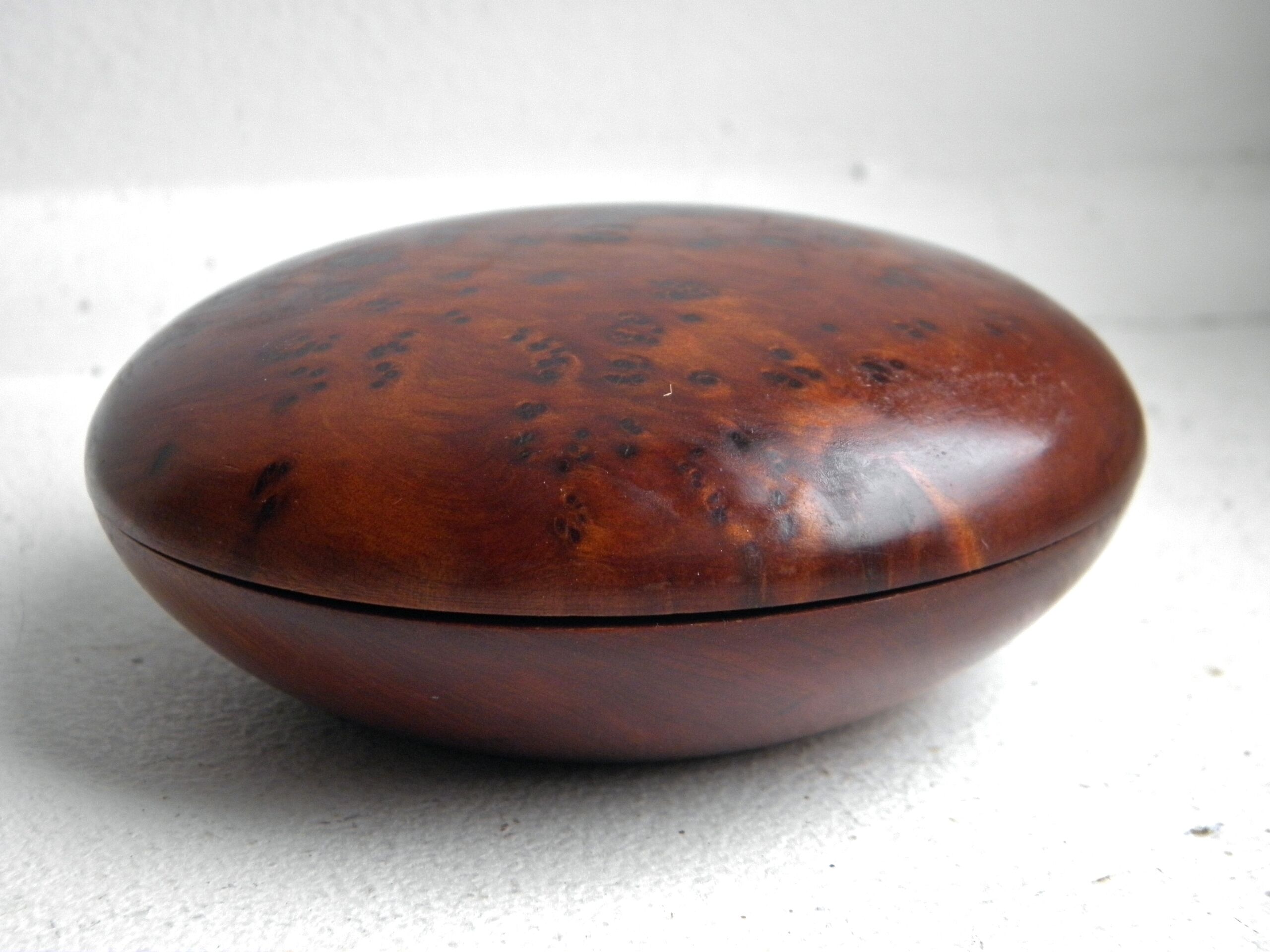 Three boxes in thuya magnifying glass