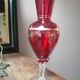 Red vase with gold decoration
