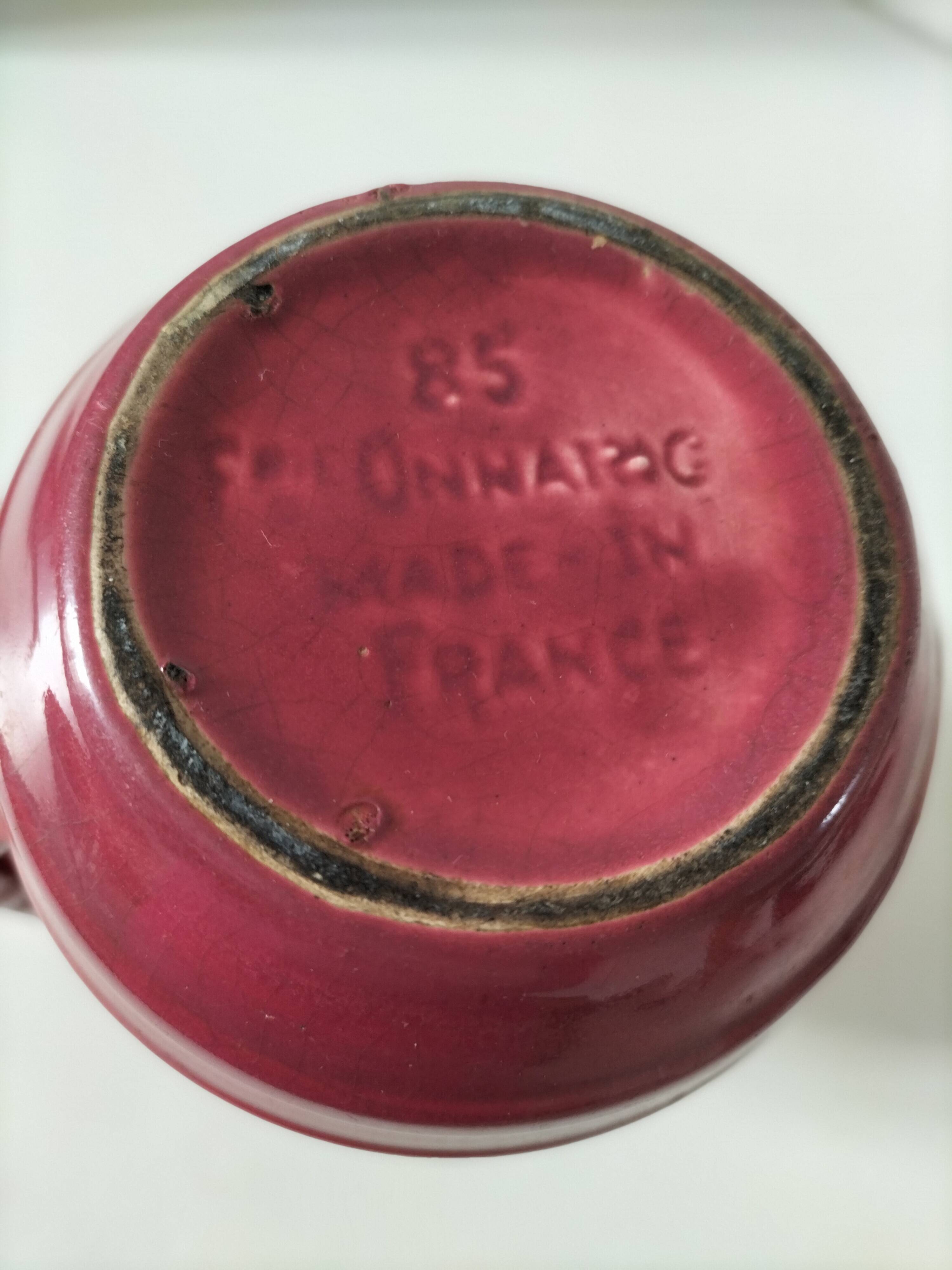 Old raspberry red pitcher from Onnaing, early 20th century.