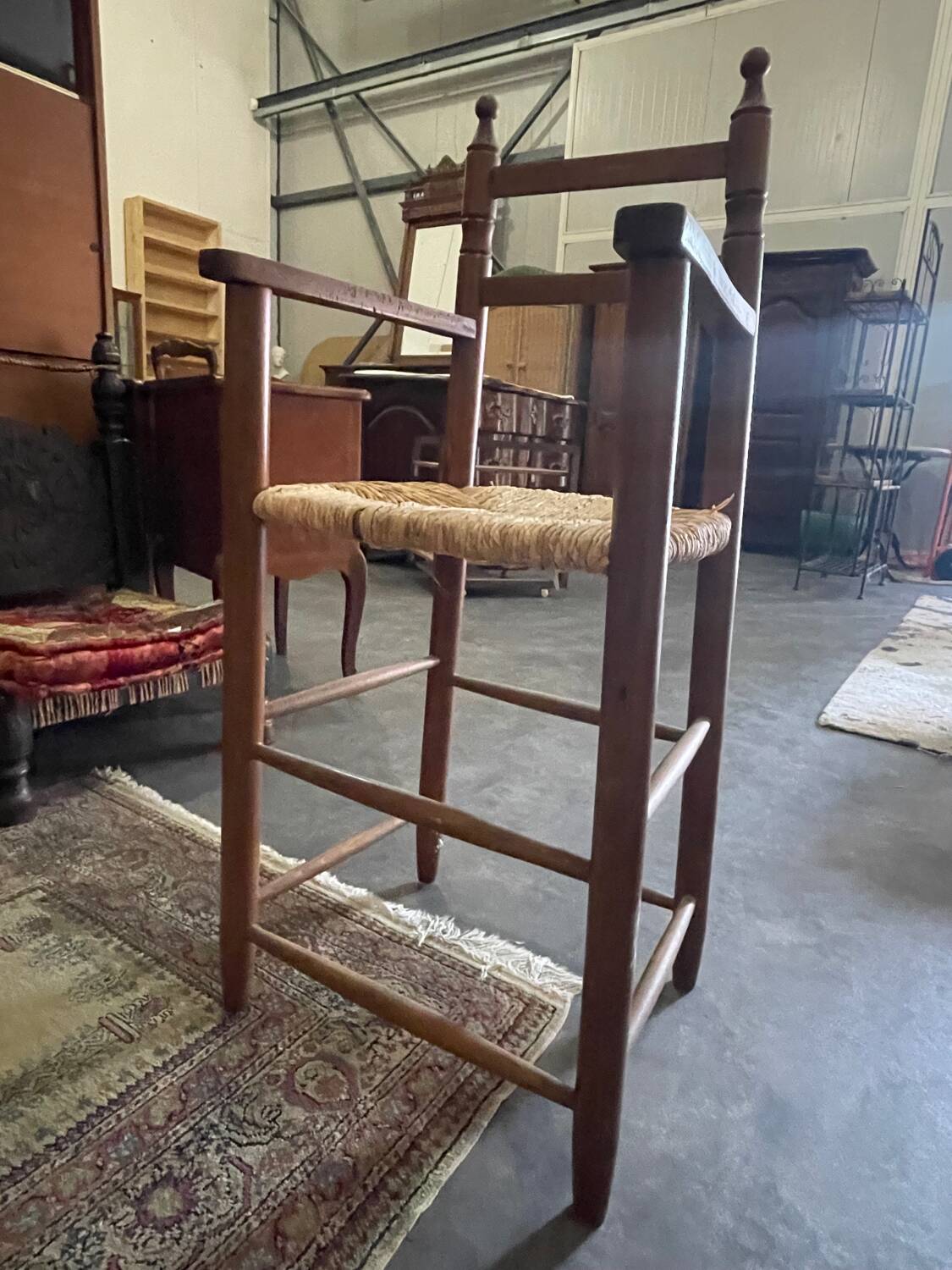 Wooden and straw high chair for children