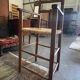 Wooden and straw high chair for children