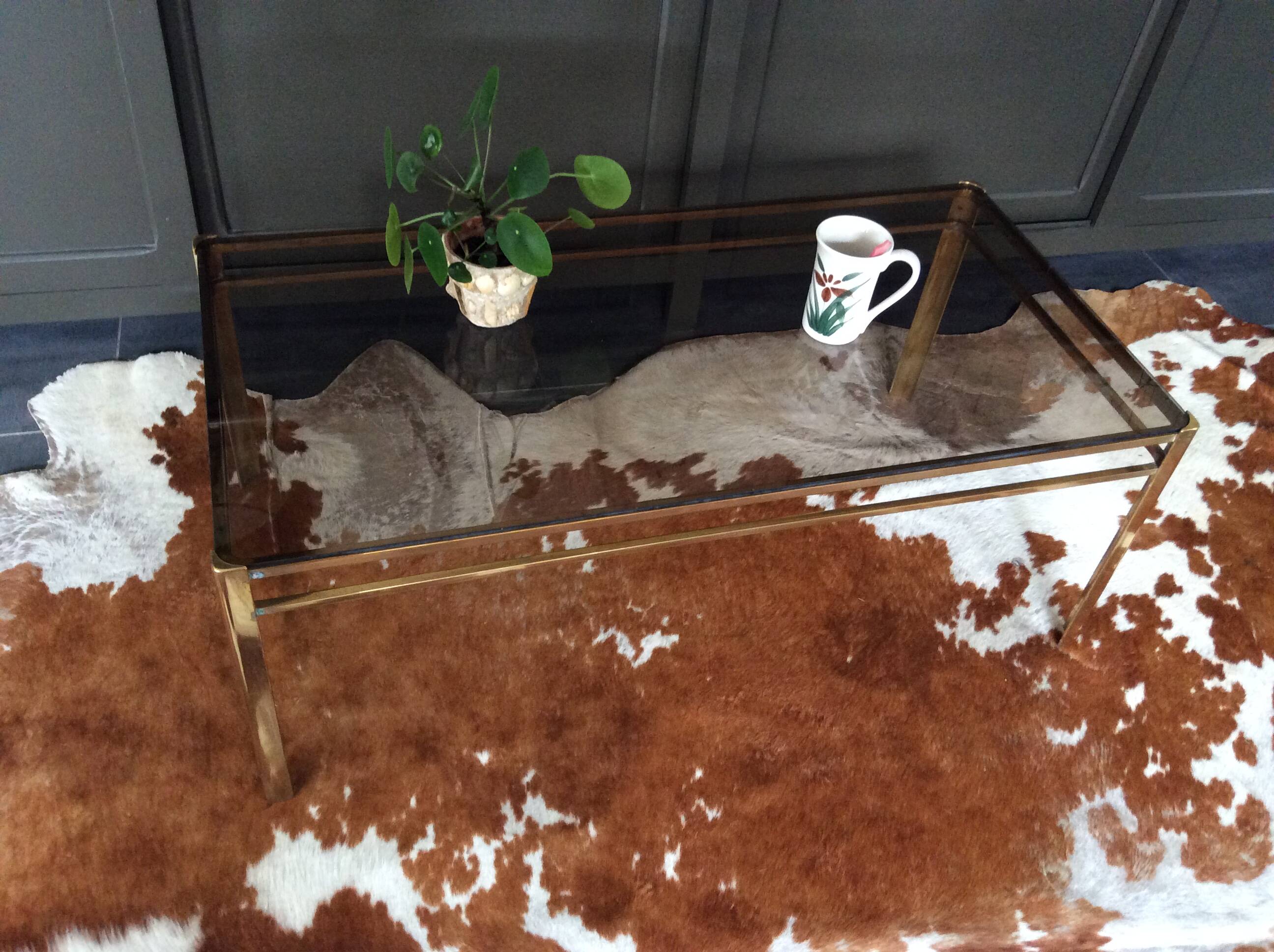 Glass and brass coffee table