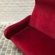 Fauteuil italien velours rouge avec pieds en laiton