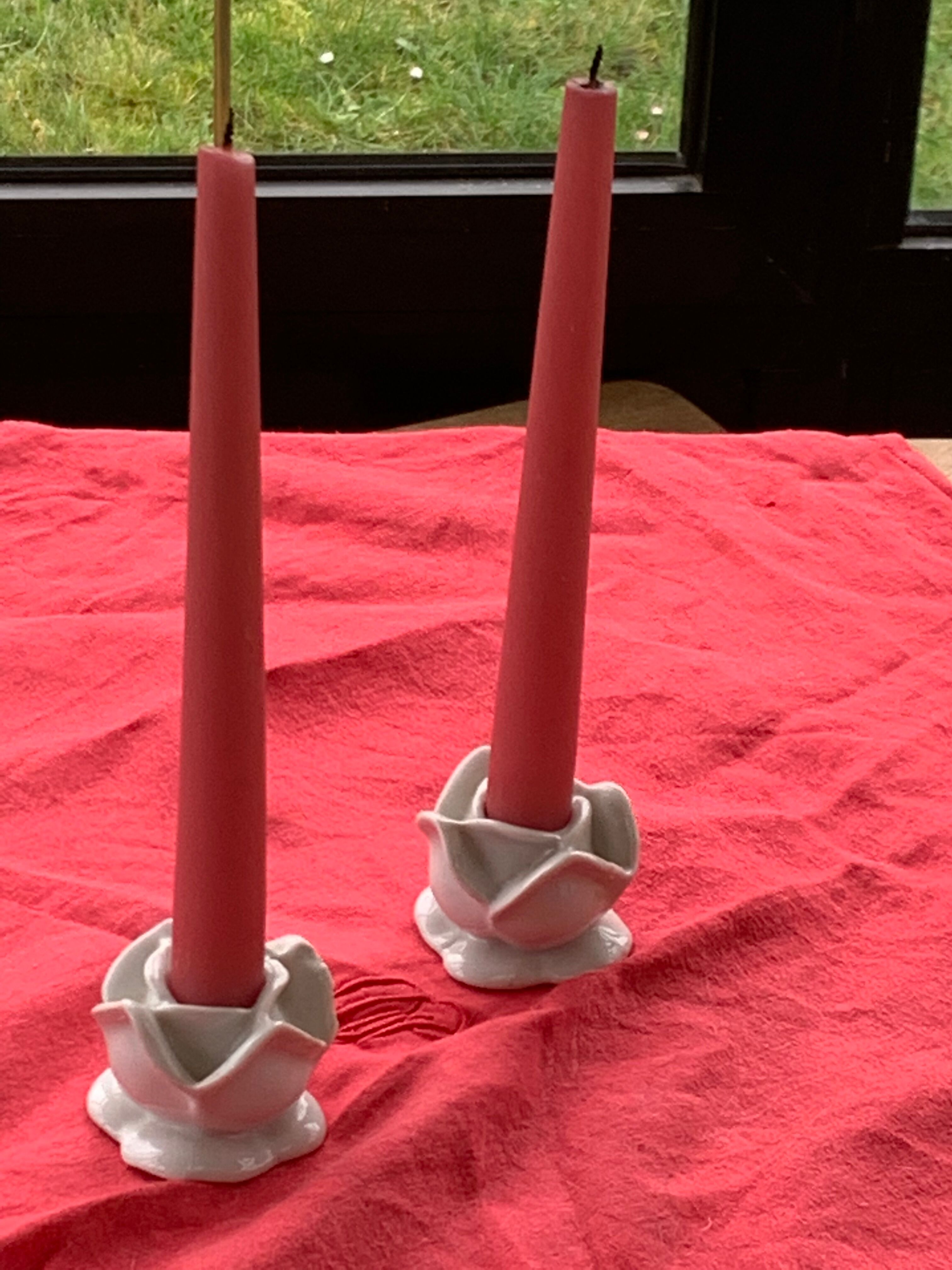 Two vintage white porcelain flower candle holders