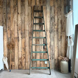 Antique ladder with green patina