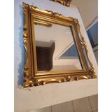 Set of 6 wooden and gilded stucco mirrors