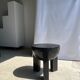 Black mango wood tripod side table with a semi-spherical top, height: 45 cm, diameter: 44 cm.