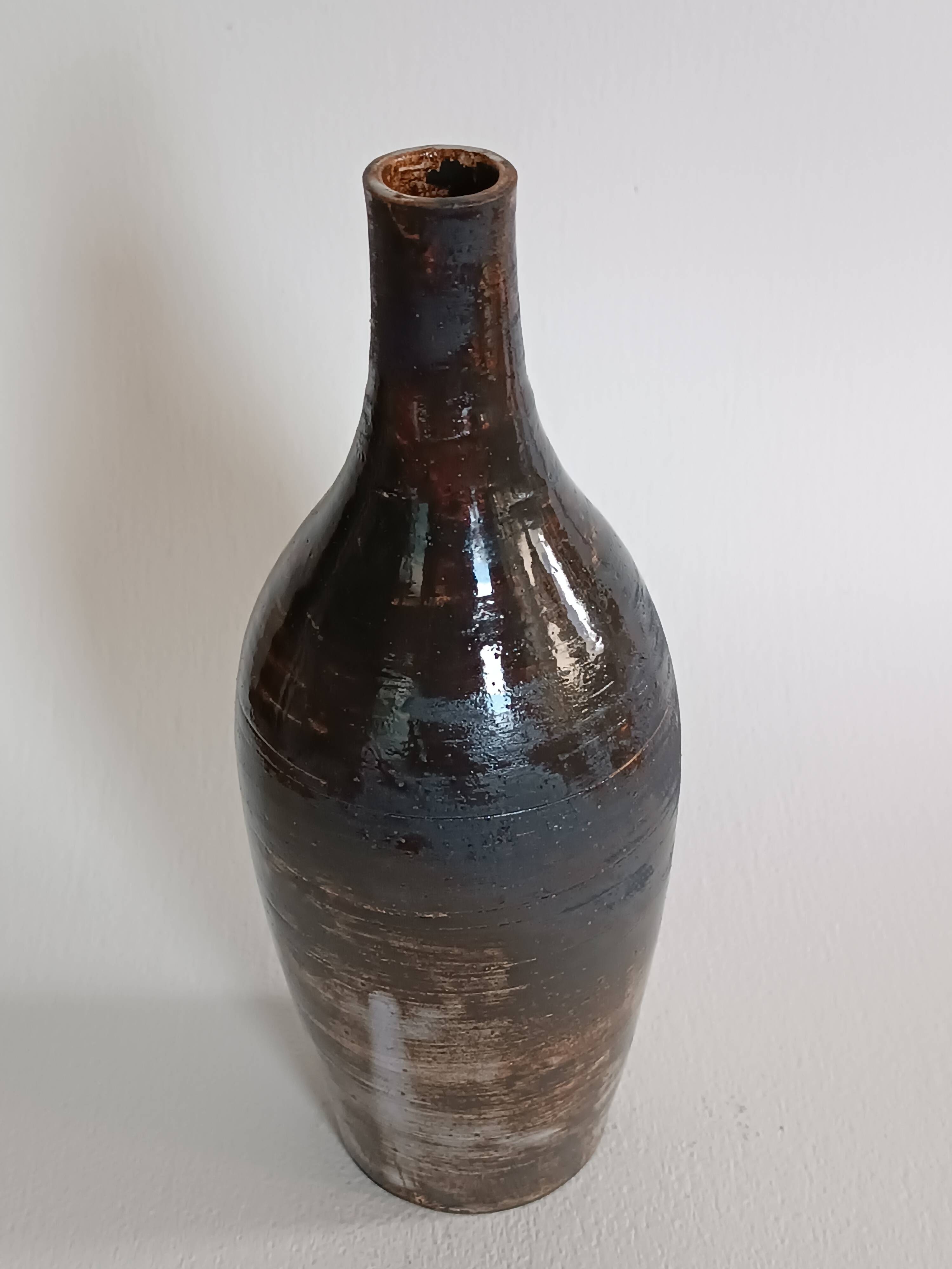 A bottle and six ceramic cups by Gérard Hofmann Vallauris 1950.