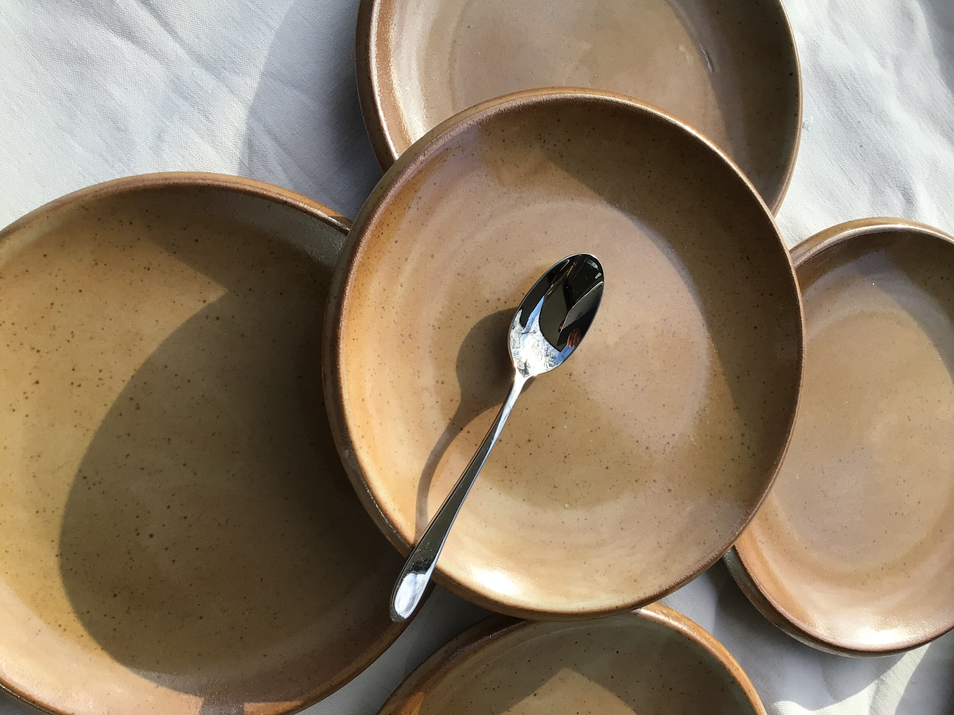 11 Dessert plates Brenne, speckled with caramel