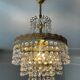 Chandelier with crystal and brass pendants