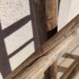 Two weathered wooden ladders H.135 cm