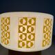 Ceiling light or wall sconce in opal glass with yellow decorations by VEB, 1950s, Germany.