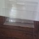 Vintage magazine rack in transparent plexiglass from the 1970s.
