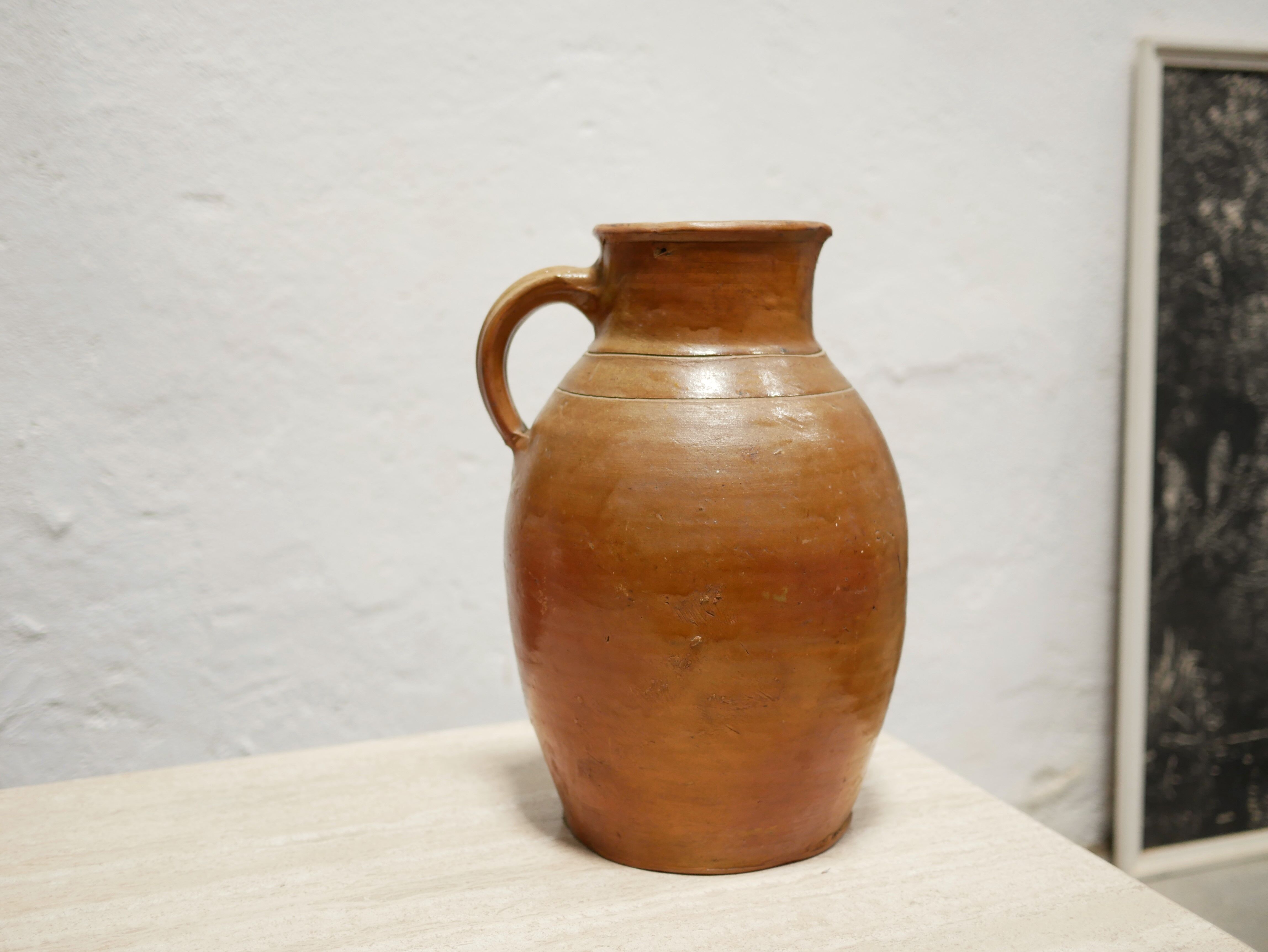 Pot à lait vintage en terre cuite vernissée