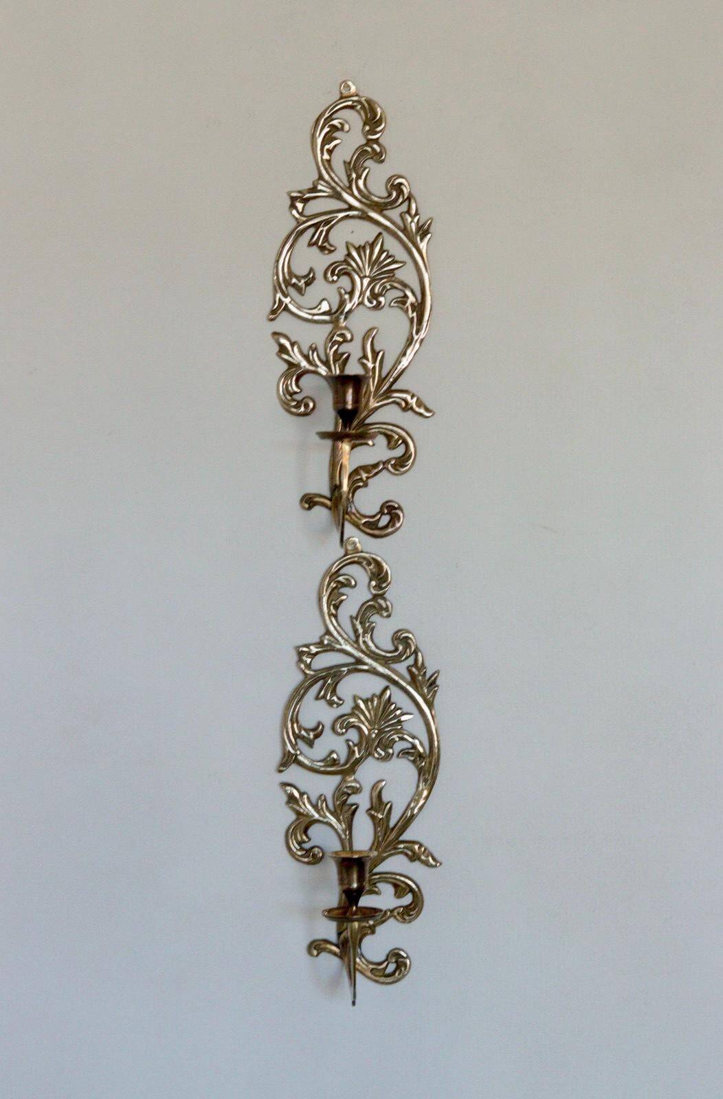 Pair of Swedish brass wall sconces from the mid-century.
