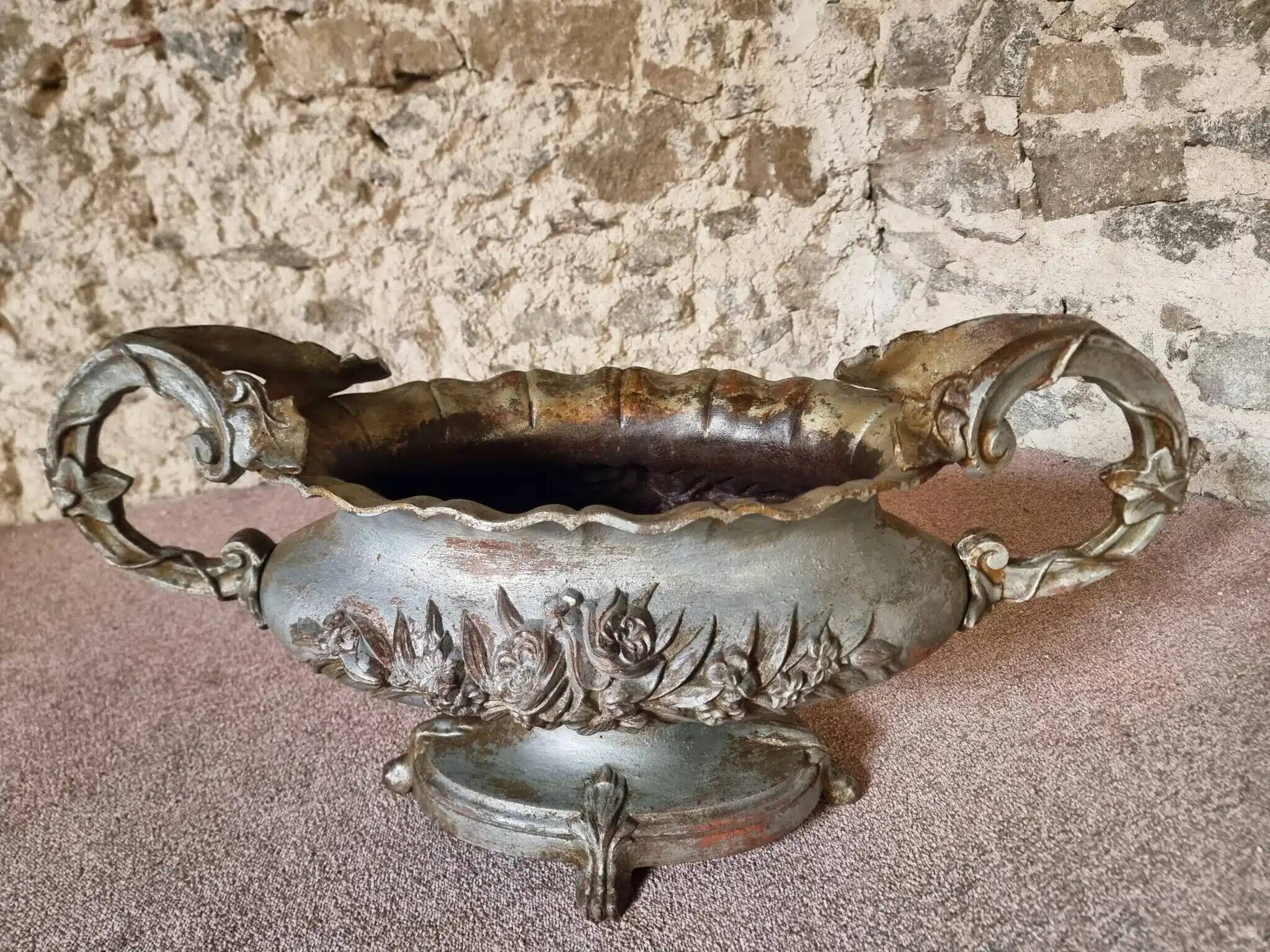 Large antique cast iron planter on a stand, France, circa 1900.